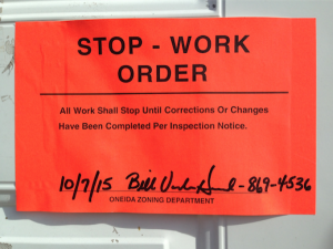 Stop Work Order sign at Diane's Bar signed by Bill VandenHeuvel